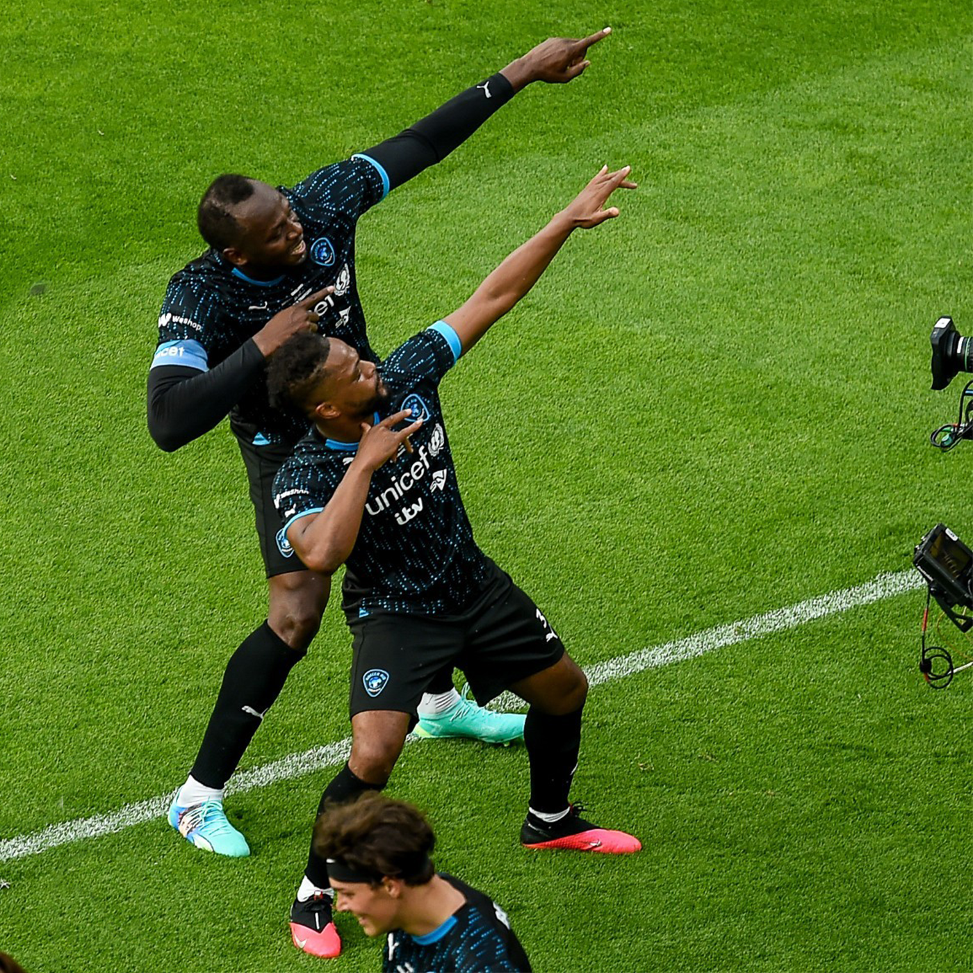 Usain Bolt Celebrates Goal In His Custom Football Boots