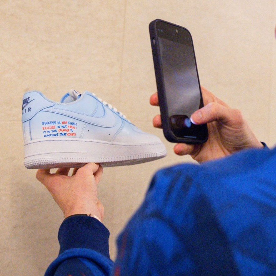 Player taking picture of Custom AF1s